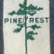 Graphic of a tree with Pine Rest in capital letters