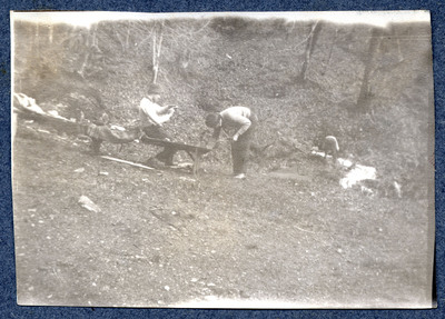Photograph of unidentified men in a wooded area