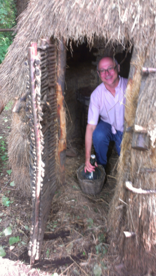 When in Rome, force your teacher into a straw hut!